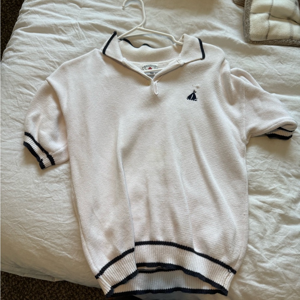 White and navy polo